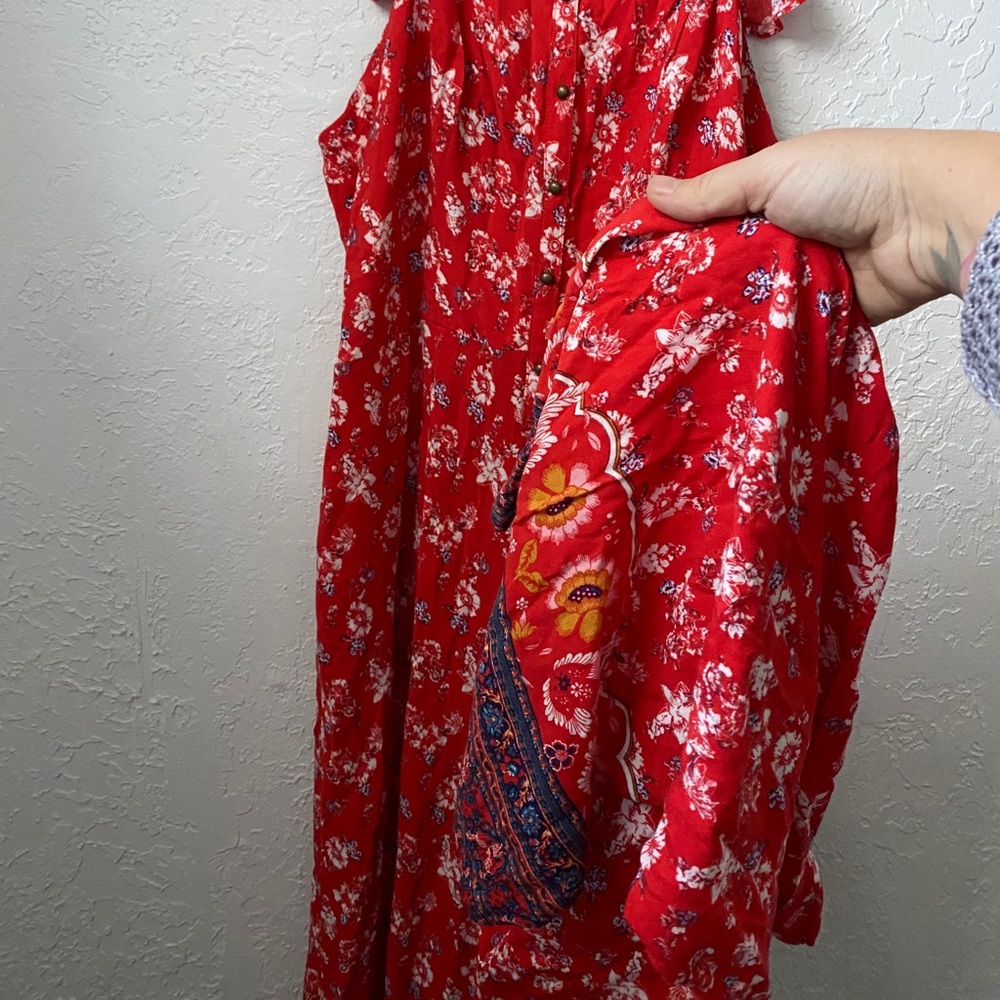 Red floral longer pant romper.
